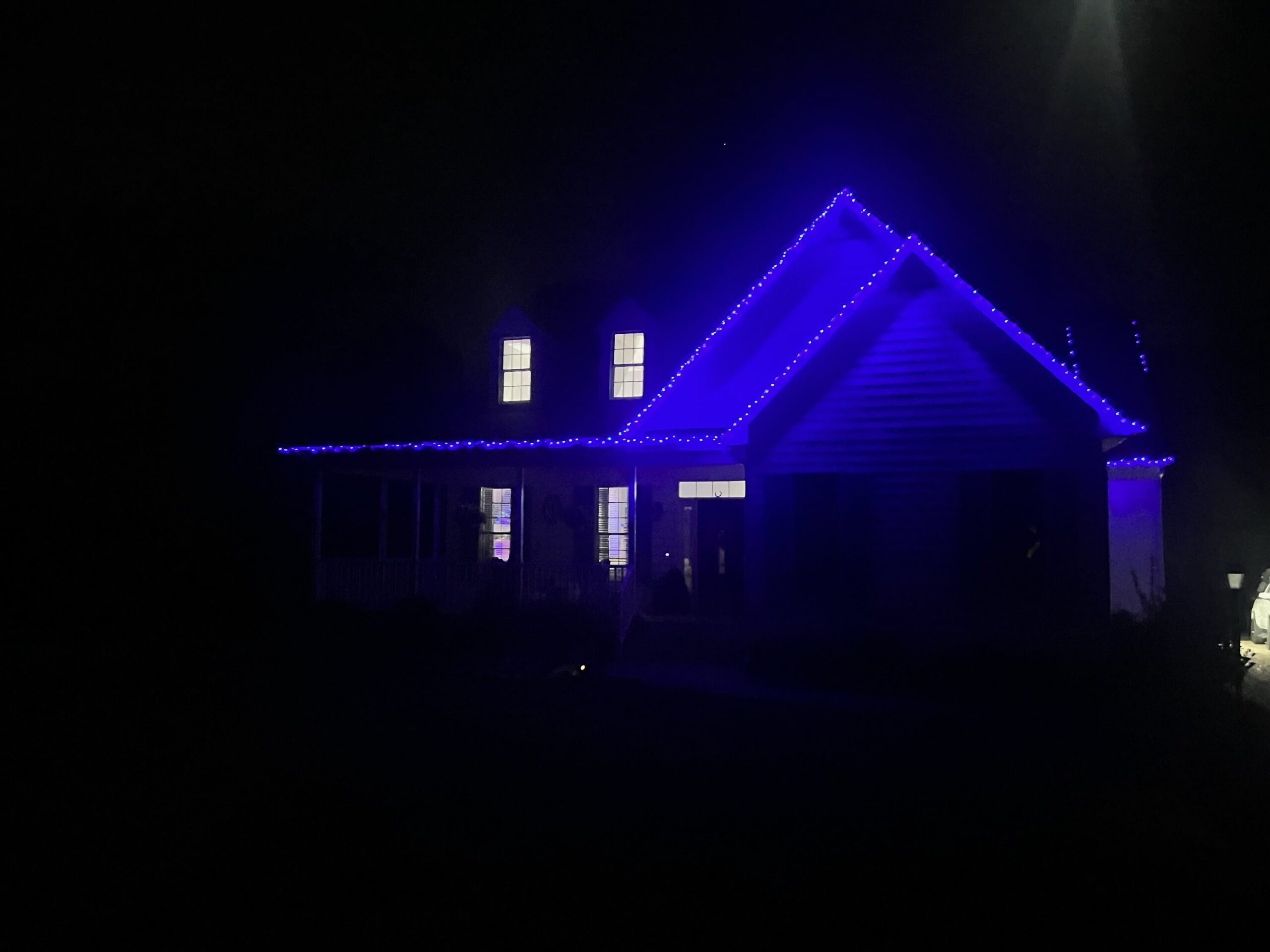 illuminated home at night with lights installed by Craven Electrical in Richmond Virginia.
